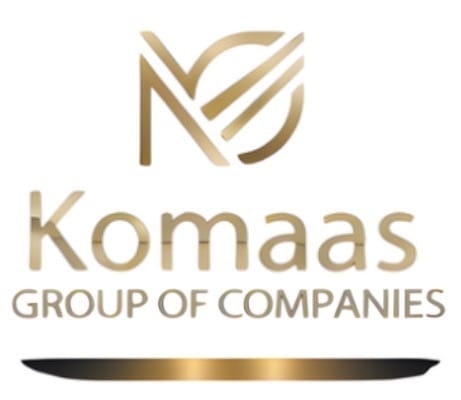 A corporate logo and branding design for Komaas Group of Companies featuring a sophisticated monogram combining the letters 'M' and 'G' in an elegant,